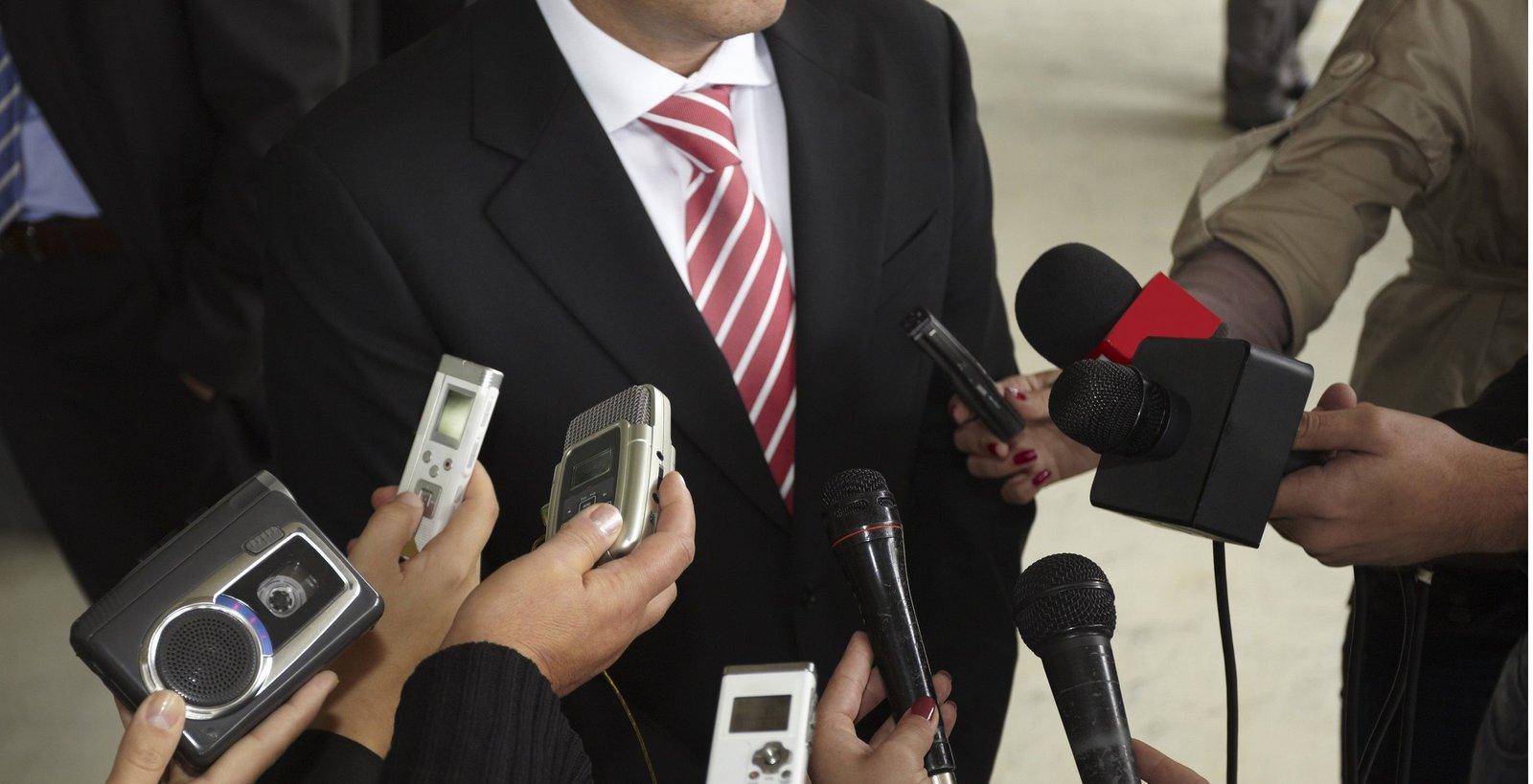 A spokesperson facing the press